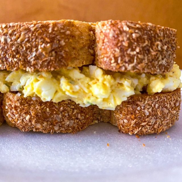 Garlicky Egg Salad Sandwich on a plate 2